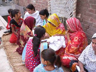 Pakistani-women-sewing
